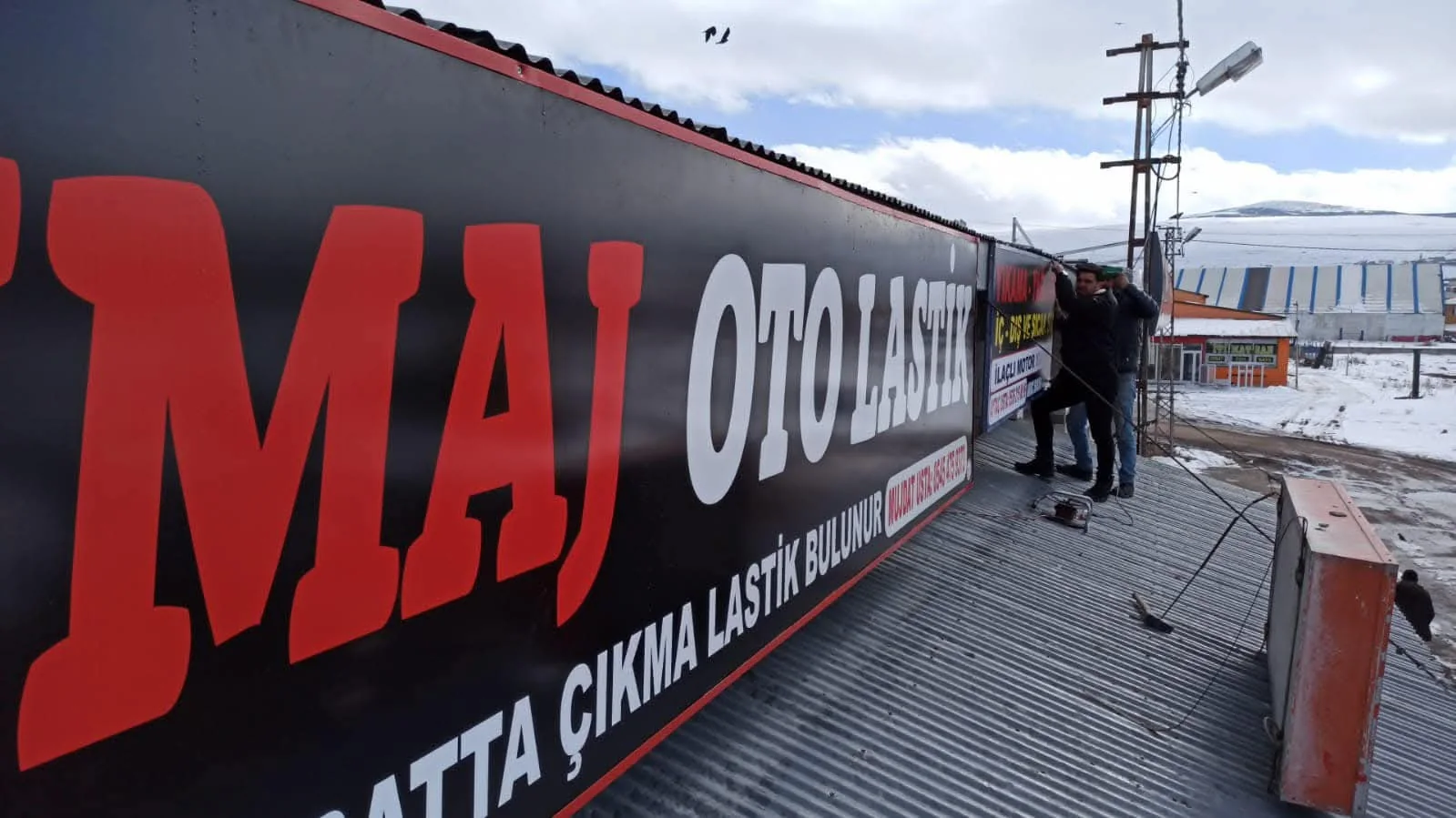 İmaj Oto Lastik — Cephe tabelası